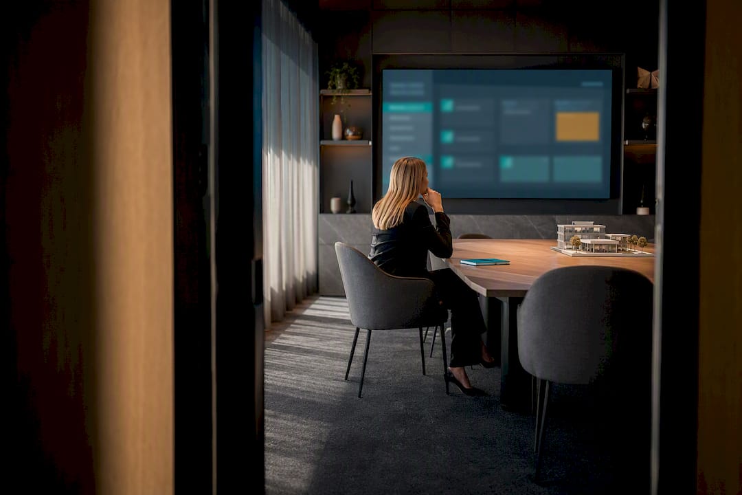 Compliance director reviewing layered governance dashboard
