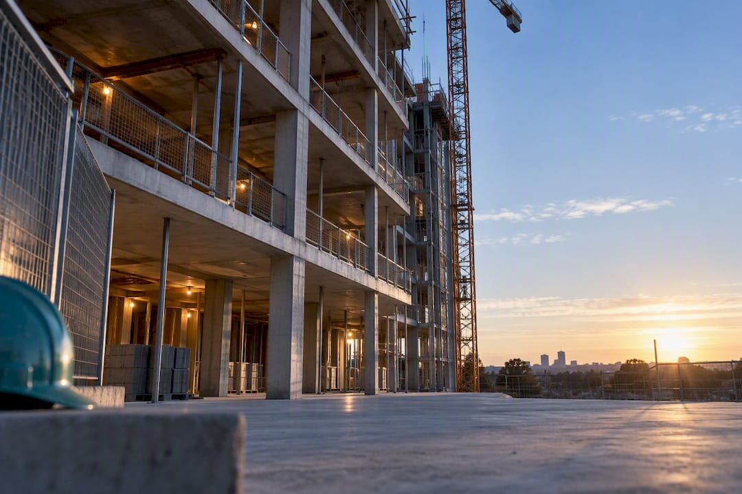 Unfinished apartment development at dawn